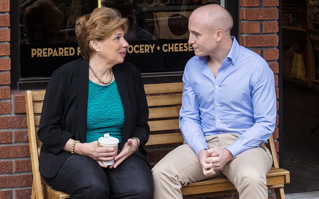 Max Rose, speaking with a constituent during his 2018 campaign. (Courtesy of Rose)