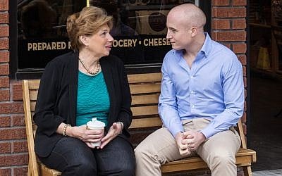 Max Rose, speaking with a constituent during his 2018 campaign. (Courtesy of Rose)