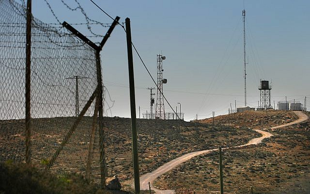 Fences, cell phone towers and water reservoirs in the West Bank, seen on November 29. 2006. (Illustrative photo: Olivier Fitoussi /Flash90) Fences, cell phone towers and water reservoirs in the West Bank, seen on November 29. 2006. (Illustrative photo: Olivier Fitoussi /Flash90)