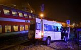 The scene where a van was hit by a passenger train in Lod on October 17, 2017. (Avi Dishi/Flash90)