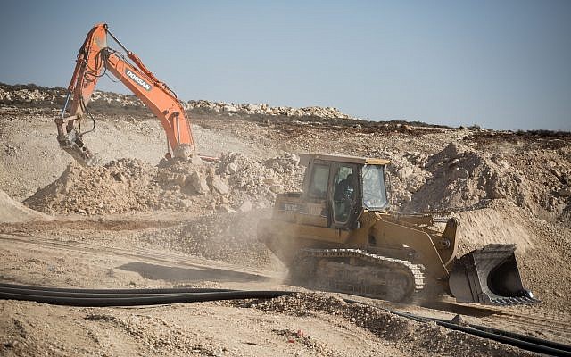 Illustrative: The construction site of the new Israeli settlement Amichai, to be established as the new home for the evacuated residents of Amona, on October 18, 2017. (Hadas Parush/Flash90) Illustrative: The construction site of the new Israeli settlement Amichai, to be established as the new home for the evacuated residents of Amona, on October 18, 2017. (Hadas Parush/Flash90)