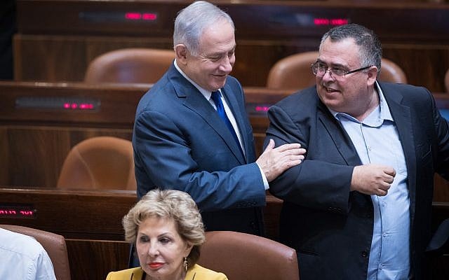 Prime Minister Benjamin Netanyahu (left) with MK David Bitan in the Knesset plenum on October 24, 2017 (Yonatan Sindel/Flash90) Prime Minister Benjamin Netanyahu (left) with MK David Bitan in the Knesset plenum on October 24, 2017 (Yonatan Sindel/Flash90)