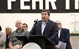 Milwaukee Bucks President Peter Feigin speaking at the opening of the team’s new training center in downtown Milwaukee as Mayor Tom Barrett, left, looks on. (Gary Dineen/Milwaukee Bucks/via JTA)