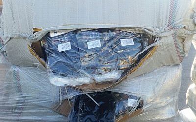 Military tactical shooting gloves intercepted as they were being smuggled into the Gaza Strip via the Kerem Shalom border crossing. (Defense Ministry)