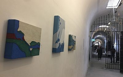 This year's Jerusalem Biennale challenged artists to seek watershed moments in their own history, and in that of the Jewish people; these are some of the works hung in the Underground Prisoners Museum, one of the eight locations of the art exhibitions (Jessica Steinberg/Times of Israel)