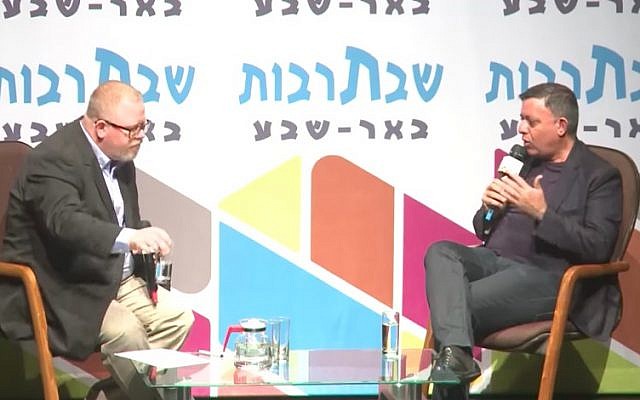Labor chairman Avi Gabbay (right) is interviewed at a cultural event in Beersheba on October 14, 2017. (Screen capture/YouTube) Labor chairman Avi Gabbay (right) is interviewed at a cultural event in Beersheba on October 14, 2017. (Screen capture/YouTube)