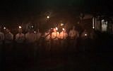 White supremacists take part in a torchlight march in Charlottesville, Virginia, on October 7, 2017. (Twitter video screenshot, used in accordance with Clause 27a of the Copyright Law)