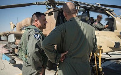 Israeli Air Force chief Maj. Gen. Amikam Norkin takes part in a training flight of the Apache helicopters, which returned to operability on October 22, 2017, after two months of being grounded following a fatal crash. (Israel Defense Forces)