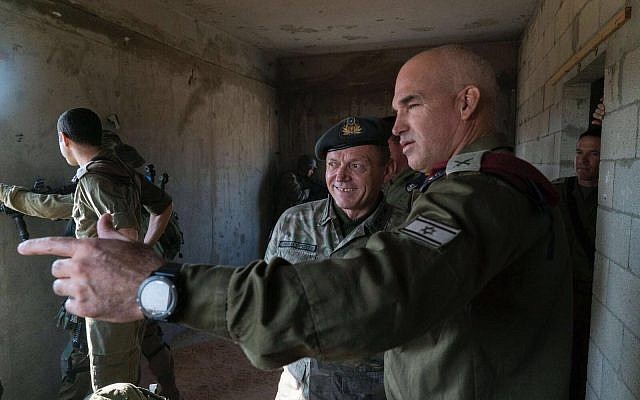 Cypriot National Guard chief Llias Leontaris, center, visits a joint Israel-Cyprus exercise with Brig. Gen. Ori Gordin, of the IDF's 98th Division, at the Israeli army's Tzeelim training base in southern Israel on October 25, 2017. (Israel Defense Forces) Cypriot National Guard chief Llias Leontaris, center, visits a joint Israel-Cyprus exercise with Brig. Gen. Ori Gordin, of the IDF's 98th Division, at the Israeli army's Tzeelim training base in southern Israel on October 25, 2017. (Israel Defense Forces)