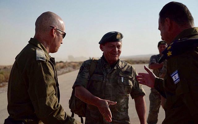 Cypriot National Guard chief Llias Leontaris, center, visits a joint Israel-Cyprus exercise with Brig. Gen. Ori Gordin, of the IDF's 98th Division, right, at the Israeli army's Tzeelim training base in southern Israel on October 25, 2017. (Israel Defense Forces) Cypriot National Guard chief Llias Leontaris, center, visits a joint Israel-Cyprus exercise with Brig. Gen. Ori Gordin, of the IDF's 98th Division, right, at the Israeli army's Tzeelim training base in southern Israel on October 25, 2017. (Israel Defense Forces)