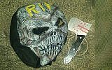 Scary mask and plastic ax confiscated by police from a youth in Jerusalem, October 6, 2017. (Israel Police)