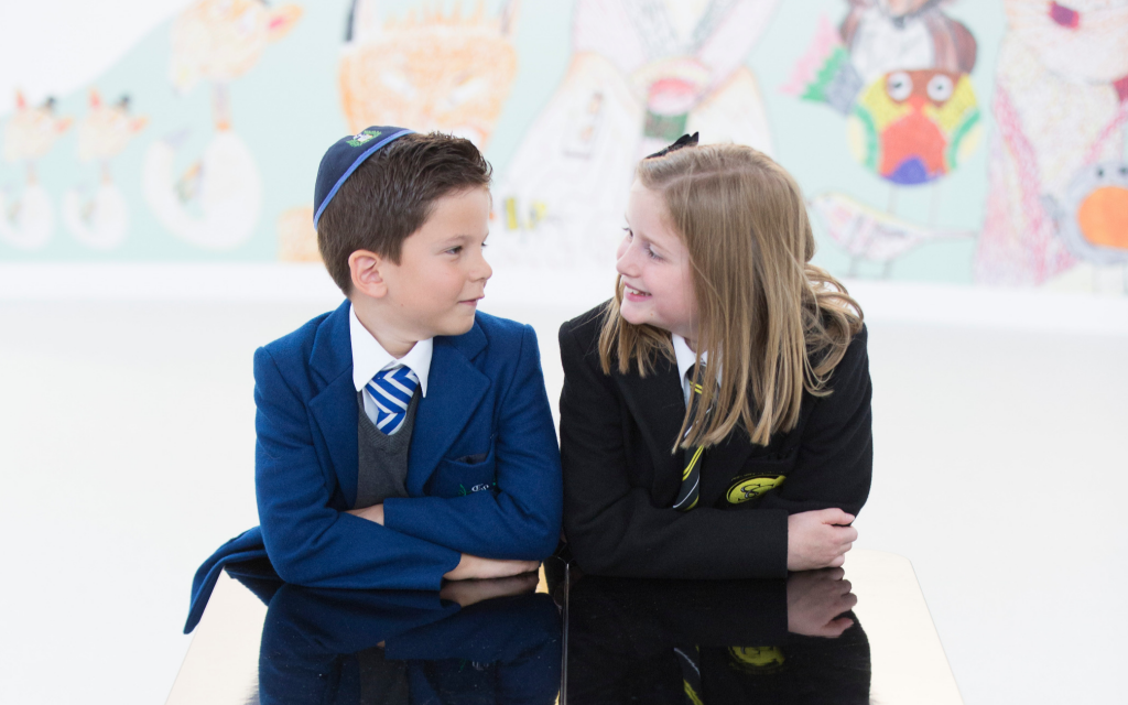 Students from the Jewish Calderwood Lodge school and St. Clare’s Catholic Primary. Both schools share one building. (Courtesy) Students from the Jewish Calderwood Lodge school and St. Clare’s Catholic Primary. Both schools share one building. (Courtesy)