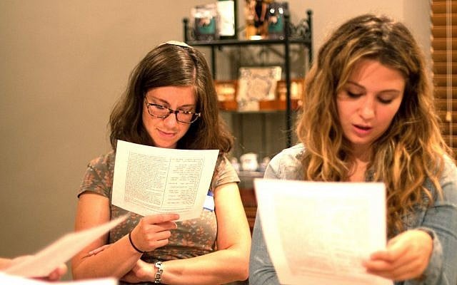 Young leaders study Torah from source sheets at a Hillel International event, November 2016. (Hillel International/via JTA)
