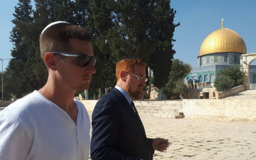 MK Yehudah Glick, right, and his son Shlomo visiting the Temple Mount in Jerusalem, October 25, 2017. (Twitter screen capture)