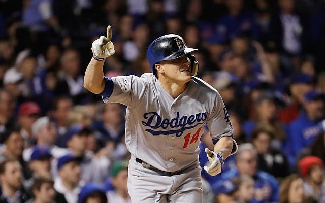 Enrique “Kiké” Hernandez reacting to hitting a grand slam in the third inning against the Chicago Cubs at Wrigley Field in Chicago, Oct. 19, 2017. (Jamie Squire/Getty Images via JTA) Enrique “Kiké” Hernandez reacting to hitting a grand slam in the third inning against the Chicago Cubs at Wrigley Field in Chicago, Oct. 19, 2017. (Jamie Squire/Getty Images via JTA)