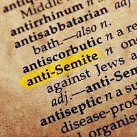 Anti-semite word in old textured dictionary (goglik83//iStock via Getty images)