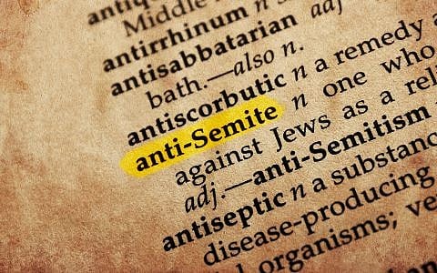 Anti-semite word in old textured dictionary (goglik83//iStock via Getty images)