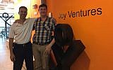 Avi Yaron, CEO of Joy Ventures, left, with chief operating officer Idan Katz at their offices in Herzliya in Sept. 2017 (Shoshanna Solomon/TimesofIsrael)