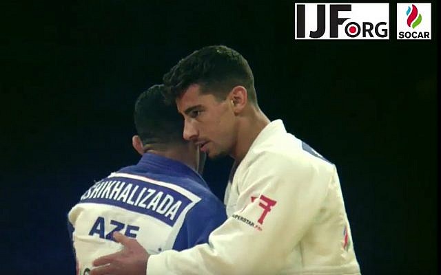 Israeli gold-medalist judoka Tal Flicker on the mat at the Judo Grand Slam in Abu Dhabi, where local judo authorities banned all Israeli symbols, October 26, 2017. (YouTube screen capture) Israeli gold-medalist judoka Tal Flicker on the mat at the Judo Grand Slam in Abu Dhabi, where local judo authorities banned all Israeli symbols, October 26, 2017. (YouTube screen capture)