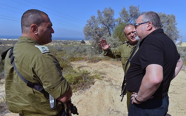 Defense Minister Avigdor Liberman, right, visits the Gaza Strip border with the head of the IDF's Gaza Division Brig. Gen. Yehuda Fuchs, center, and Southern Command chief Maj. Gen. Eyal Zamir on October 25, 2017. (Ariel Hermoni/Defense Ministry) Defense Minister Avigdor Liberman, right, visits the Gaza Strip border with the head of the IDF's Gaza Division Brig. Gen. Yehuda Fuchs, center, and Southern Command chief Maj. Gen. Eyal Zamir on October 25, 2017. (Ariel Hermoni/Defense Ministry)