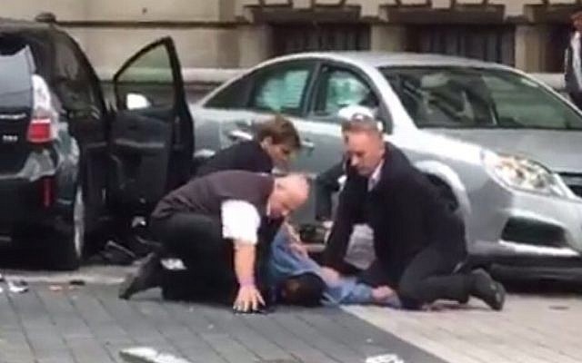 Screenshot of a man, suspected of running over pedestrians outside the Natural History Museum in London, being detained, October 7, 2017.