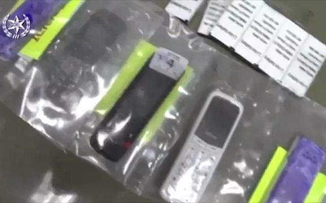 Illustrative: Smuggled cellphones discovered in an Israeli prison, October 2017 (Israel Police)