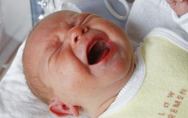 In this November 12, 2008 file photo, a baby cries in its bed in a hospital in Bremen, northern Germany. (AP Photo/Joerg Sarbach) In this November 12, 2008 file photo, a baby cries in its bed in a hospital in Bremen, northern Germany. (AP Photo/Joerg Sarbach)
