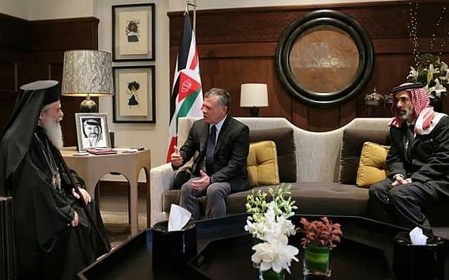 The Greek Orthodox Patriarch (left) meets with Jordan's King Abdullah in Amman to seek support over controversy sparked by church land sales, October 18, 2017. (King of Jordans bureau). The Greek Orthodox Patriarch (left) meets with Jordan's King Abdullah in Amman to seek support over controversy sparked by church land sales, October 18, 2017. (King of Jordans bureau).