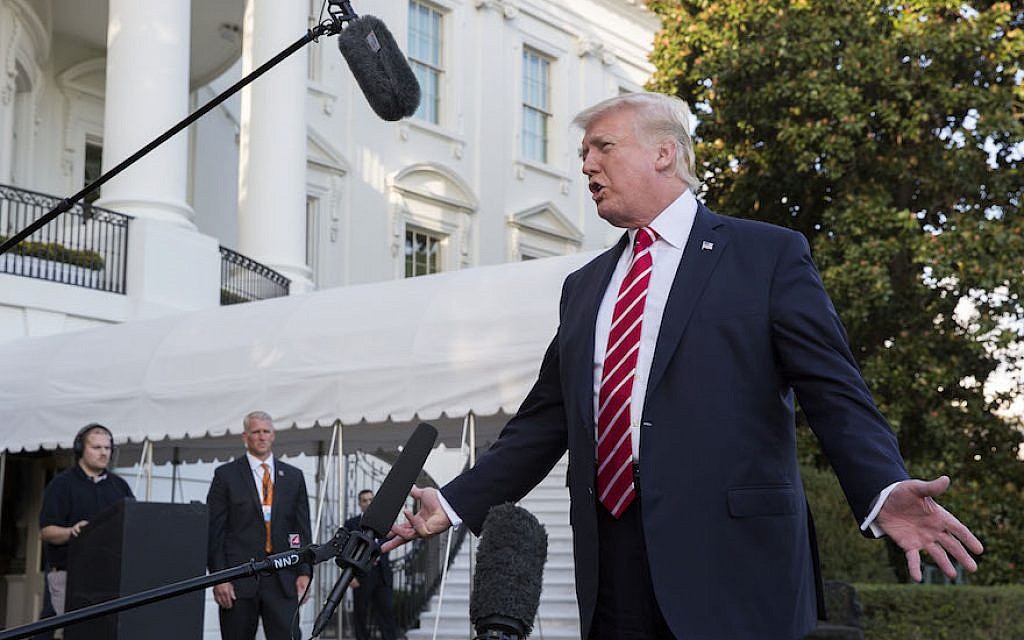 US President Donald Trump speaking to the media before boarding Marine One on the South Lawn of the White House, October 7, 2017. (Shawn Thew-Pool/Getty Images via JTA) US President Donald Trump speaking to the media before boarding Marine One on the South Lawn of the White House, October 7, 2017. (Shawn Thew-Pool/Getty Images via JTA)