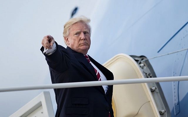 US President Donald Trump boards Air Force One at Andrews Air Force Base on October 7, 2017, in Maryland en route to North Carolina. (AFP PHOTO / Brendan Smialowski) US President Donald Trump boards Air Force One at Andrews Air Force Base on October 7, 2017, in Maryland en route to North Carolina. (AFP PHOTO / Brendan Smialowski)