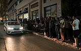 The line late at night outside the office of the Population Immigration and Border Authority, September 29, 2017. (Luke Tress/Times of Israel)