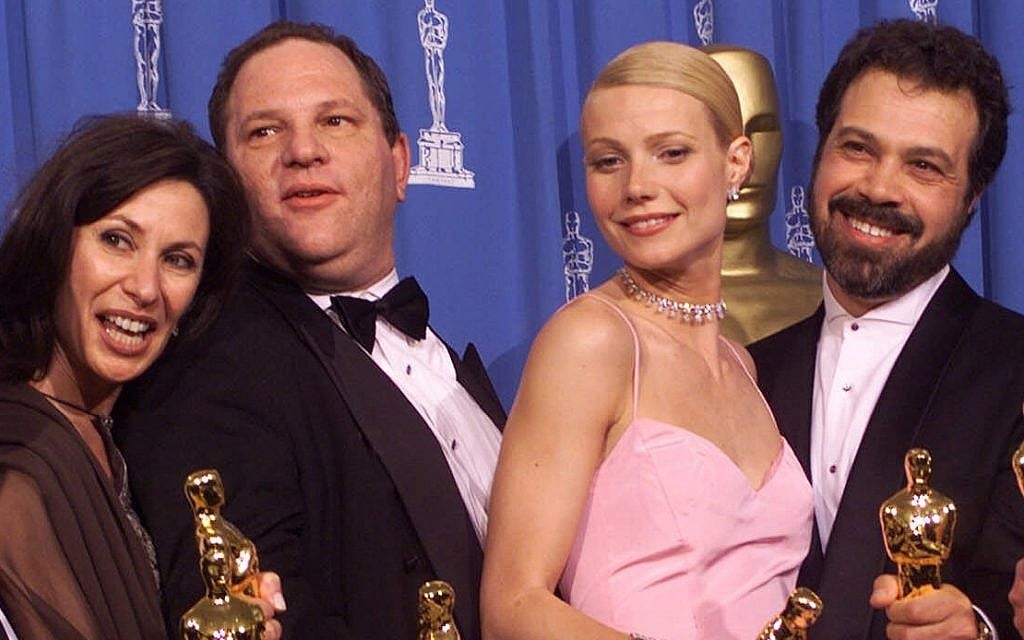 Harvey Weinstein (second from left) celebrates with Gwyneth Paltrow (second from right) after receiving the Oscar for best picture for 'Shakespeare In Love' during the 71st Annual Academy Awards Sunday, March 21, 1999, at the Dorothy Chandler Pavilion of the Los Angeles Music Center (AP Photo/Dave Caulkin)