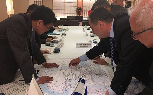 Transportation Minister Yisrael Katz, center right, points to a map during a meeting with Japanese Foreign Minister Tara Kono, left, during an official visit to Japan, October 24, 2017. (Courtesy) Transportation Minister Yisrael Katz, center right, points to a map during a meeting with Japanese Foreign Minister Tara Kono, left, during an official visit to Japan, October 24, 2017. (Courtesy)