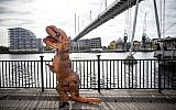 Illustrative: A cosplayer dressed as a dinosaur attends the MCM Comic Con at ExCeL exhibition centre in London on October 28, 2017. (AFP/Tolga AKMEN)