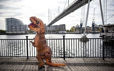 Illustrative: A cosplayer dressed as a dinosaur attends the MCM Comic Con at ExCeL exhibition centre in London on October 28, 2017. (AFP/Tolga AKMEN)