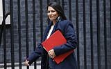 Britain's International Development Secretary Priti Patel arrives at 10 Downing Street for the weekly meeting of the cabinet in central London on October 31, 2017. AFP PHOTO / Tolga AKMEN)