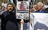 Demonstrators protest the 100th anniversary of  Balfour Declaration outside the British Consulate in East Jerusalem, on November 2, 2017. (Ahmad Gharabli/AFP)
