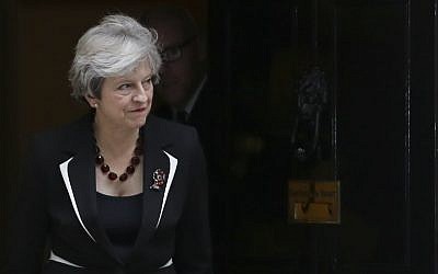 British Prime Minister Theresa May walks out of 10 Downing street to greet Israeli Prime Minister Benjamin Netanyahu in London on November 2, 2017.(AFP PHOTO / Daniel LEAL-OLIVAS)