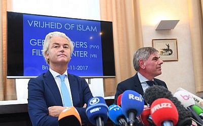 Illustrative: Dutch far-right politician Geert Wilders (L) and right-wing Belgium Flemish nationalist politician Filip Dewinter hold a press conference in Brussels on November 3, 2017. (Emmanuel Dunand/AFP)
