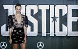 Israeli actress Gal Gadot poses at a photo shoot to promote the movie 'Justice League' on November 4, 2017, in London. (AFP Photo/Tolga Akmen)