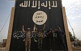 Iraqi forces are seen in November 4, 2017, in the center of the Iraqi city of Qaim, after retaking it from Islamic State jihadists a day earlier. (AFP Photo/Ahmad al-Rubaye)