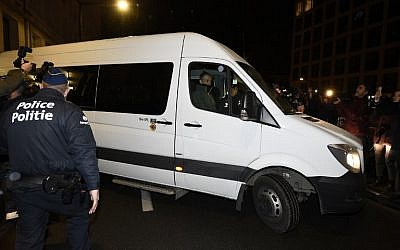 A van, presumed to be transporting the deposed Catalan leader, leaves the public prosecutor's office in Brussels on November 5, 2017. (AFP/ BELGA AND AFP/JOHN THYS)