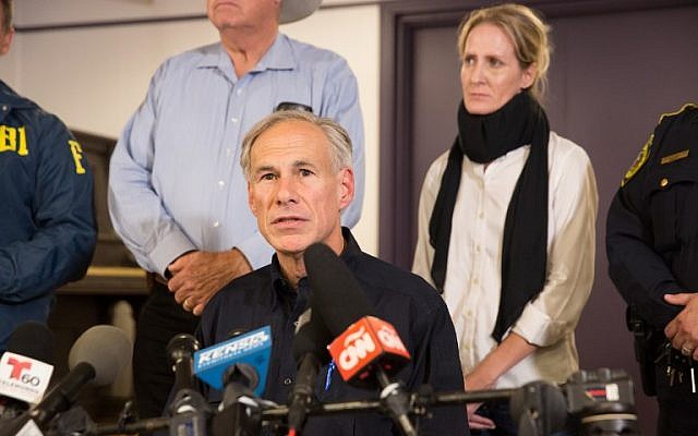 Texas Governor Greg Abbott speaks at a press conference in Sutherland Springs, Texas, November 5, 2017. (AFP/SUZANNE CORDEIRO) Texas Governor Greg Abbott speaks at a press conference in Sutherland Springs, Texas, November 5, 2017. (AFP/SUZANNE CORDEIRO)