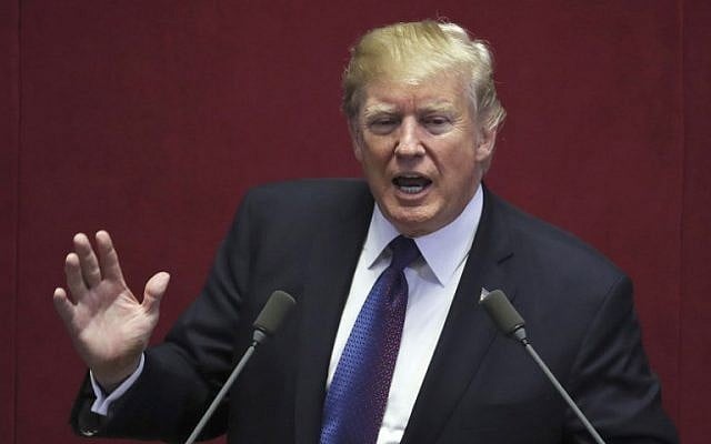 US President Donald Trump addresses the National Assembly in Seoul on November 8, 2017. (AFP PHOTO / Laurent FIEVET AND Lee Jin-man) US President Donald Trump addresses the National Assembly in Seoul on November 8, 2017. (AFP PHOTO / Laurent FIEVET AND Lee Jin-man)