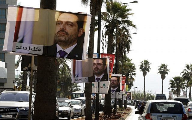 Posters of Lebanese Prime Minister Saad Hariri hang on Beirut's seaside corniche on November 10, 2017, with a caption reading below in Arabic: "#We_are_all_Saad." (AFP PHOTO / JOSEPH EID) Posters of Lebanese Prime Minister Saad Hariri hang on Beirut's seaside corniche on November 10, 2017, with a caption reading below in Arabic: "#We_are_all_Saad." (AFP PHOTO / JOSEPH EID)