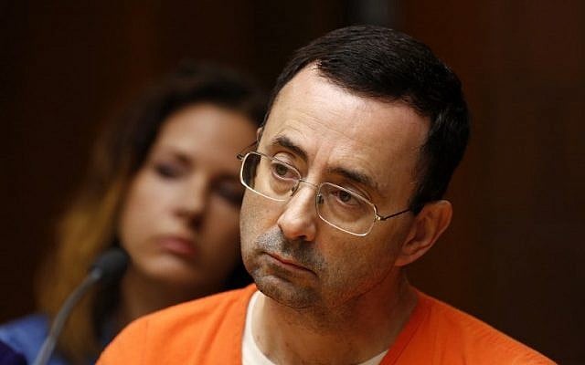 Former Michigan State University and USA Gymnastics doctor Larry Nassar seen in the 55th District Court, June 23, 2017. (AFP/JEFF KOWALSKY) Former Michigan State University and USA Gymnastics doctor Larry Nassar seen in the 55th District Court, June 23, 2017. (AFP/JEFF KOWALSKY)