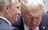 Russia's President Vladimir Putin (L) and US President Donald Trump talk as they attend the Asia-Pacific Economic Cooperation (APEC) leaders' summit in the central Vietnamese city of Danang on November 11, 2017. (AFP/Sputnik/Mikhail Klimentyev)