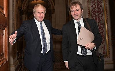 Britain's Foreign Secretary Boris Johnson, left, meets with Richard Ratcliffe, the husband of British-Iranian woman Nazanin Zaghari-Ratcliffe who is jailed in Iran, at the Foreign and Commonwealth Office in London, November 15, 2017. (AFP/Stefan Rousseau)