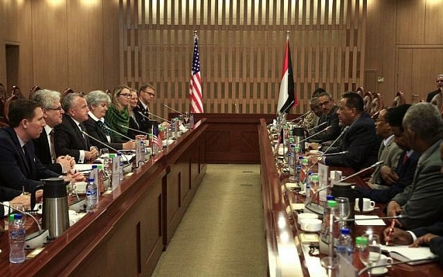 US Deputy Secretary of State John Sullivan (3rd left) meets with Sudanese Foreign Minister Ibrahim Ghandour (4th right) at the foreign ministry headquarters in the capital Khartoum on November 16, 2017. (AFP/ Ebrahim Hamid) US Deputy Secretary of State John Sullivan (3rd left) meets with Sudanese Foreign Minister Ibrahim Ghandour (4th right) at the foreign ministry headquarters in the capital Khartoum on November 16, 2017. (AFP/ Ebrahim Hamid)
