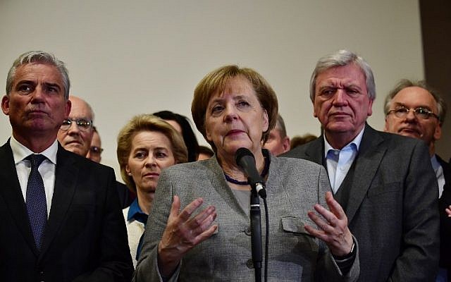 German Chancellor and leader of the Christian Democratic Union (CDU) party, Angela Merkel, speaks after talks on forming a new government broke down on November 19, 2017 in Berlin. (AFP Photo/Tobias Schwartz) German Chancellor and leader of the Christian Democratic Union (CDU) party, Angela Merkel, speaks after talks on forming a new government broke down on November 19, 2017 in Berlin. (AFP Photo/Tobias Schwartz)